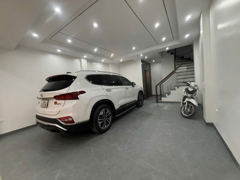 BÁN NHÀ ĐỘI CẤN GARA Ô TÔ 7 TẦNG THANG MÁY 56M MẶT TIỀN 52M 24 TỶ