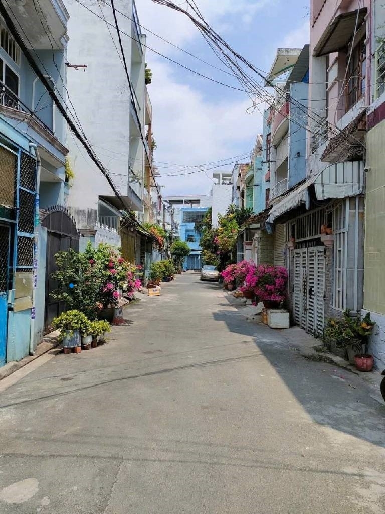 Bán nhà HXH 5.5m Vườn Lài Tân Phú 73m2 4.05 x 18m 2 tầng 4PN dòng tiền 15tr gần chợ Tân Phú chỉ 7.5