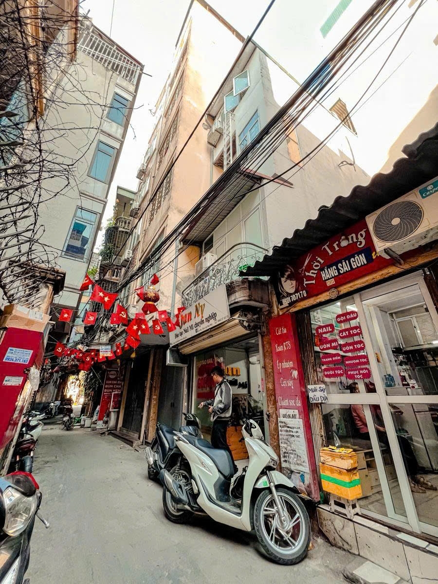 BÁN NHÀ TRƯỜNG CHINH ĐỐNG ĐA 44m 5 TẦNG KINH DOANH SẦM UẤT DÒNG TIỀN TỐT GIÁ 12.8 TỶ