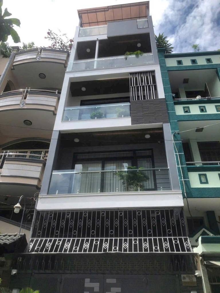 Nhà nguyên căn mặt tiền đường 30m Khu DC An Sương 4.5 x 20m 1 hầm 4 tầng